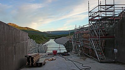 Good weather for building gate opening in dam at hydro power station